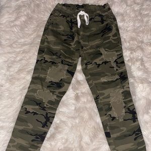 Slightly worn army fatigue pants.